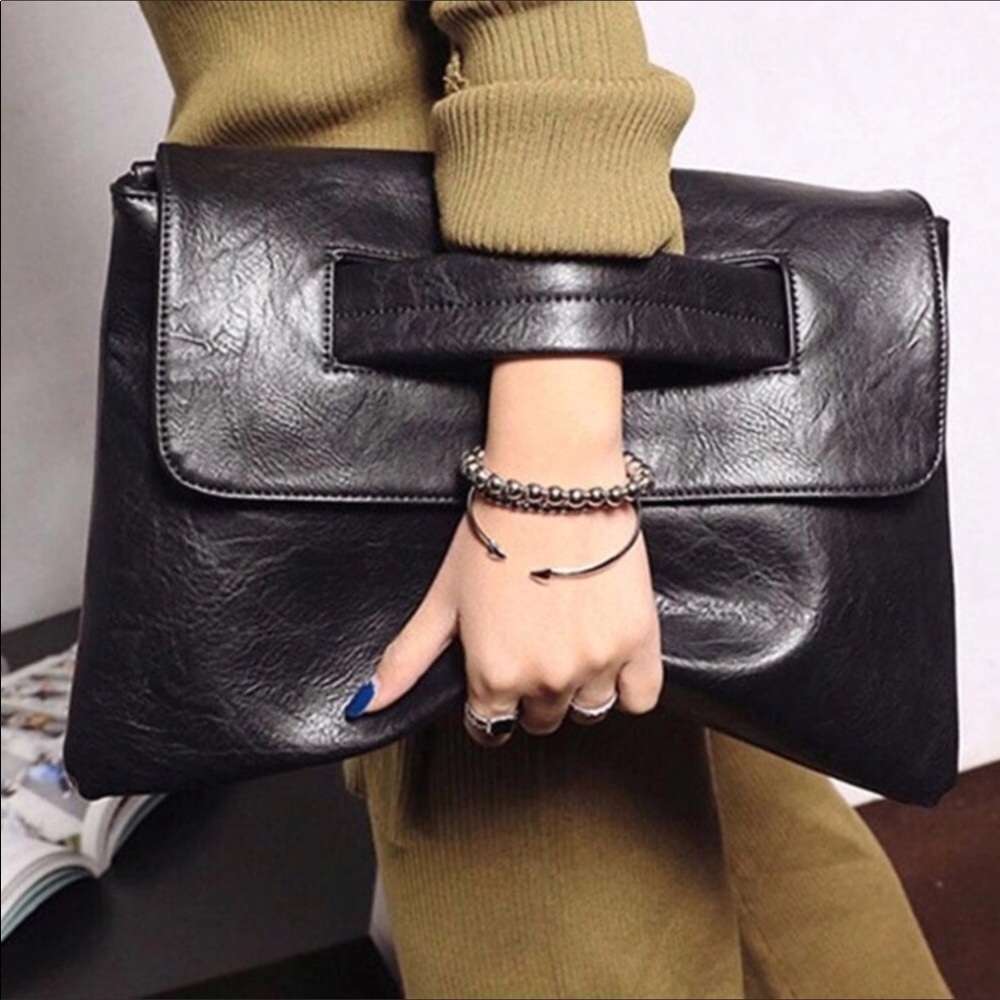 Black clutch with removable strap